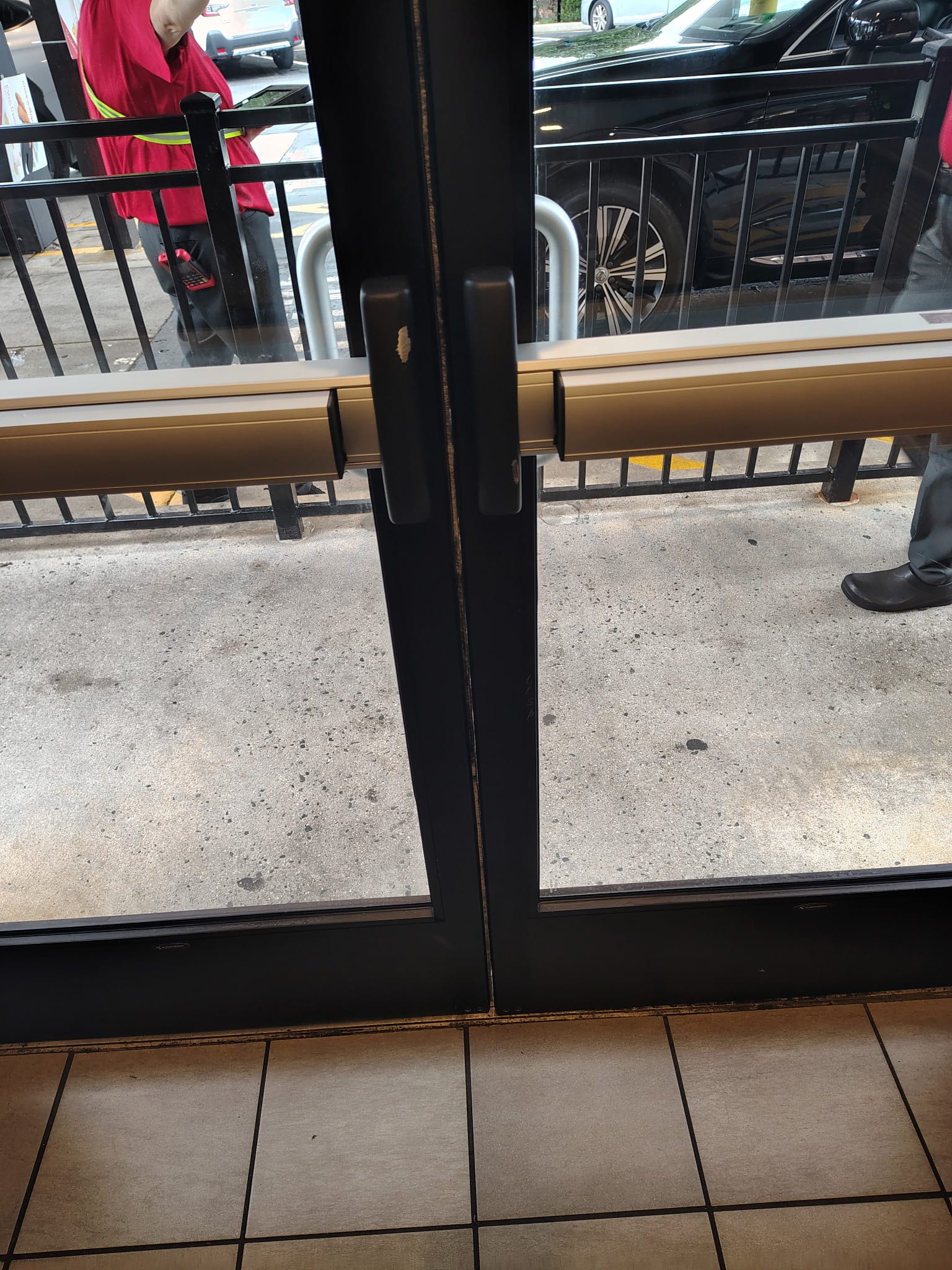 Commercial storefront panic bar hardware installation